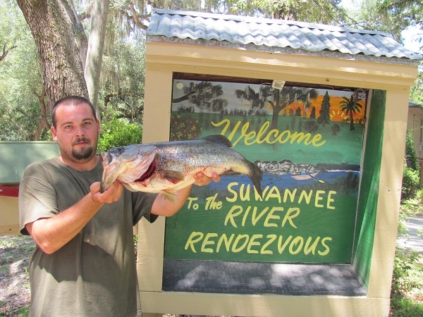 Man Holding Large Catfish