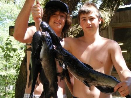 Two Boys with Four Fish