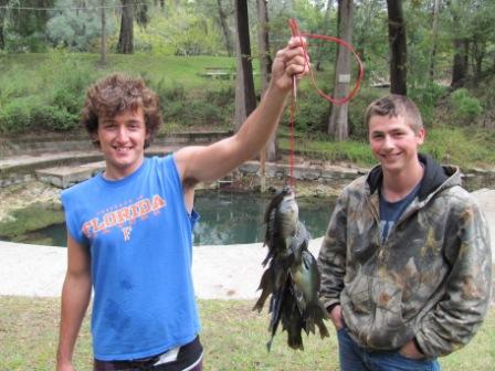 Two Boys with Caught Fish
