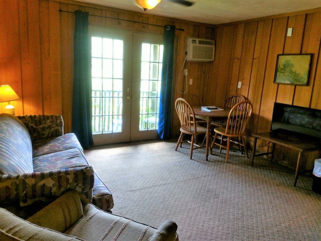 Table, Couch & Chairs in River Room