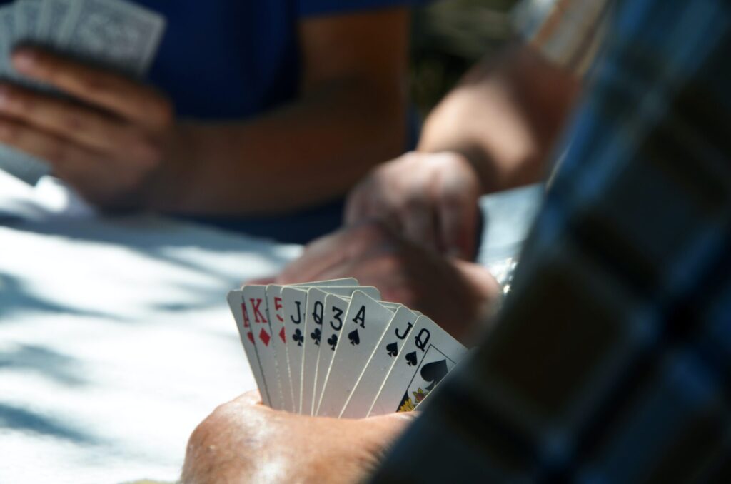 playing card games on a camping trip